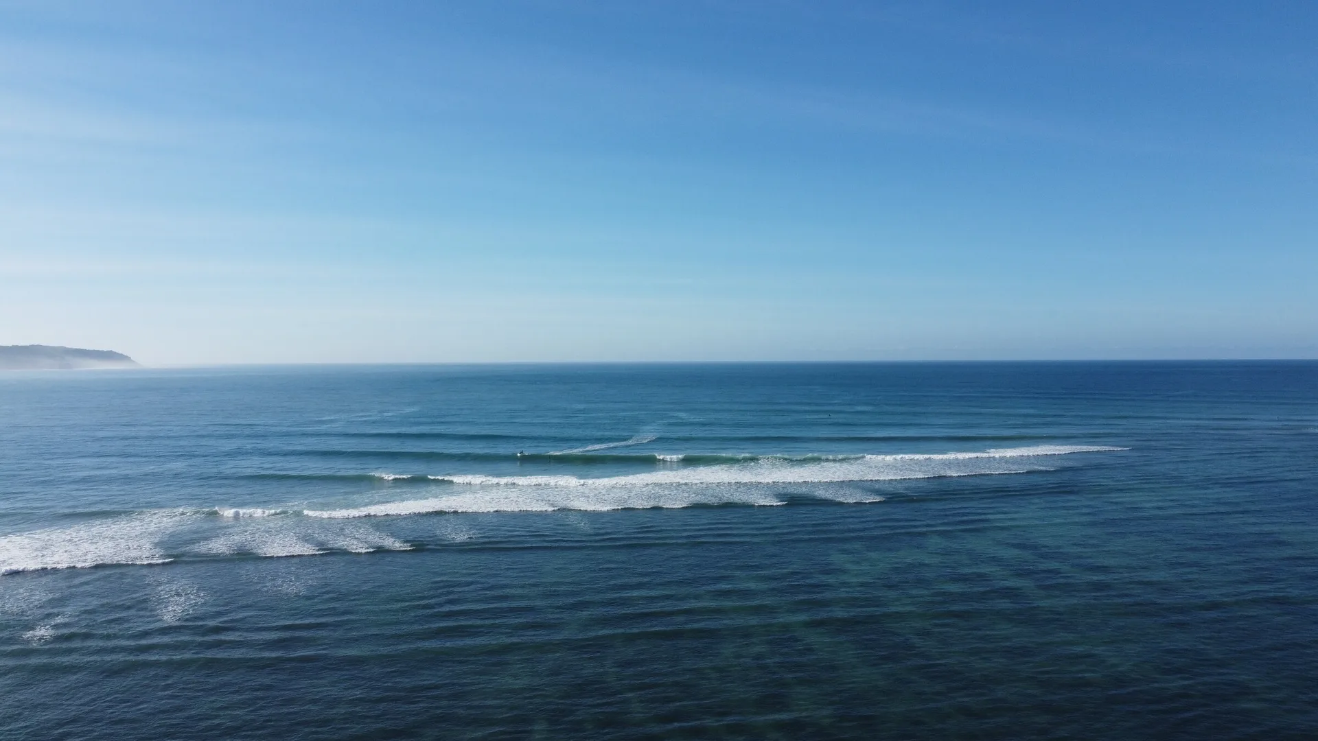 A clean wave line off Pantai Kerewe