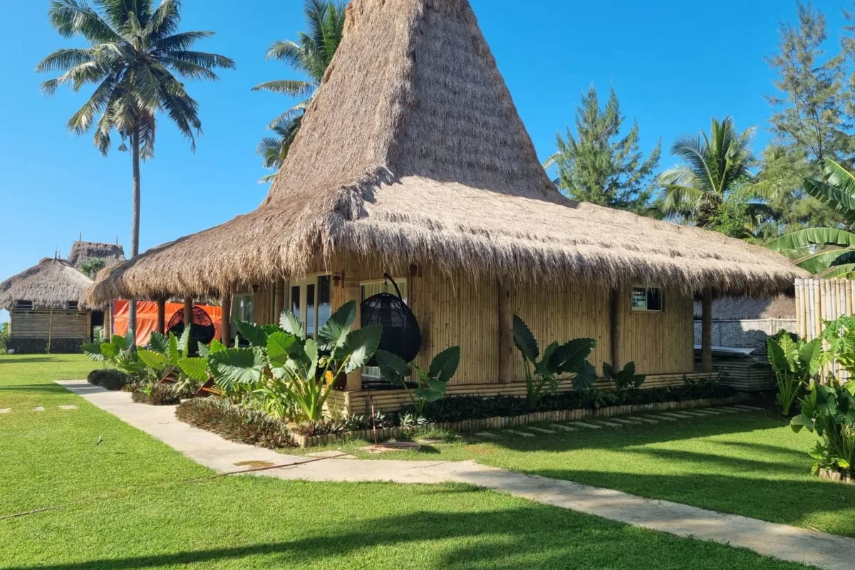 Villa Dua, thatched bungalow and terrace from the garden