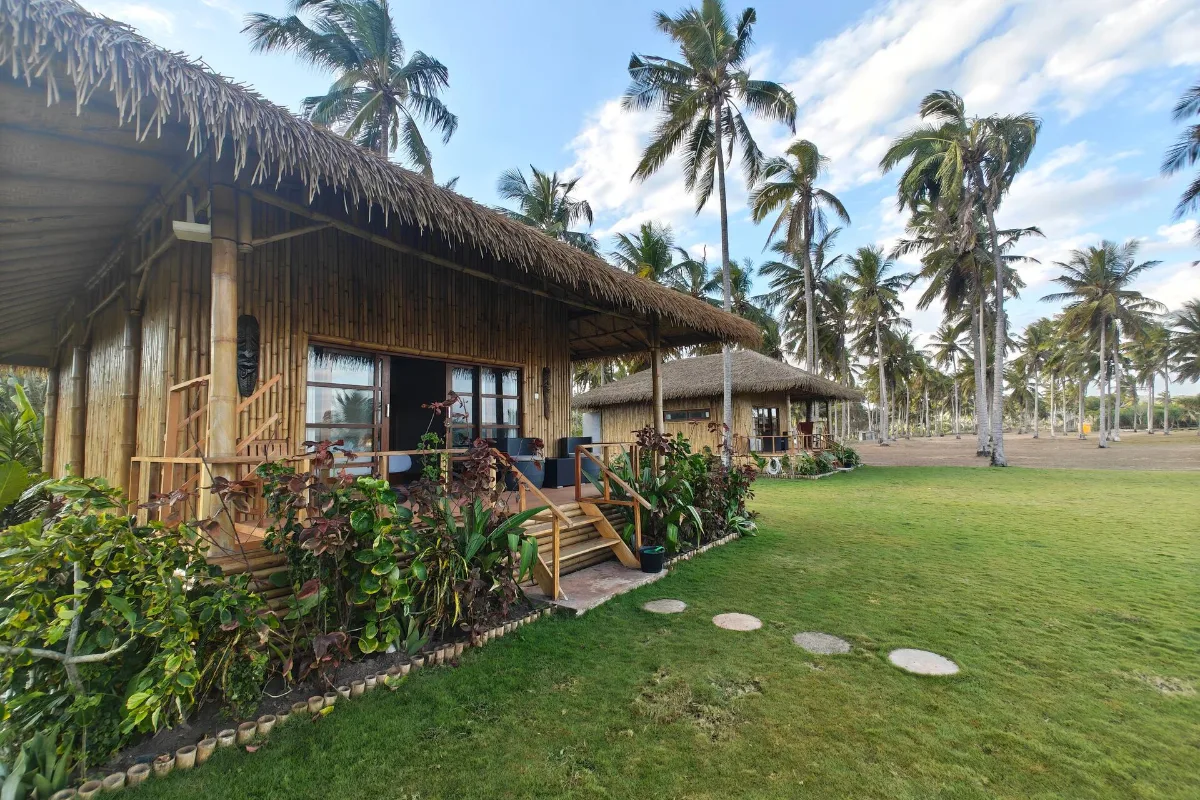 Villa Enam, the standalone bungalow and its terrace on the lawn